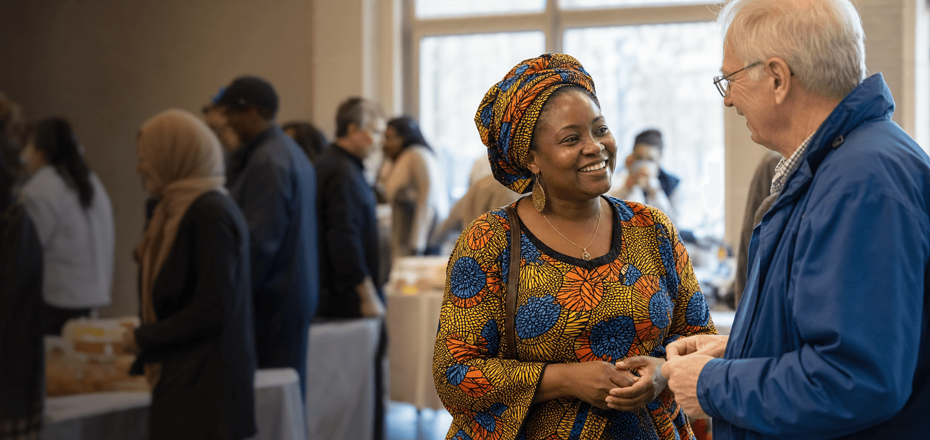 Community members and volunteers connecting at a KLHIISA event